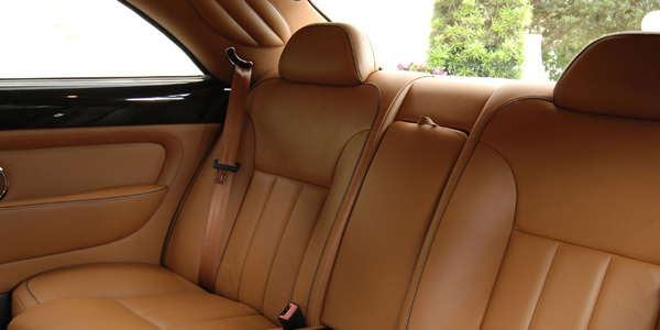 Bentley Brooklands finished in Redwood Hide with Cinder Sandwich Piping